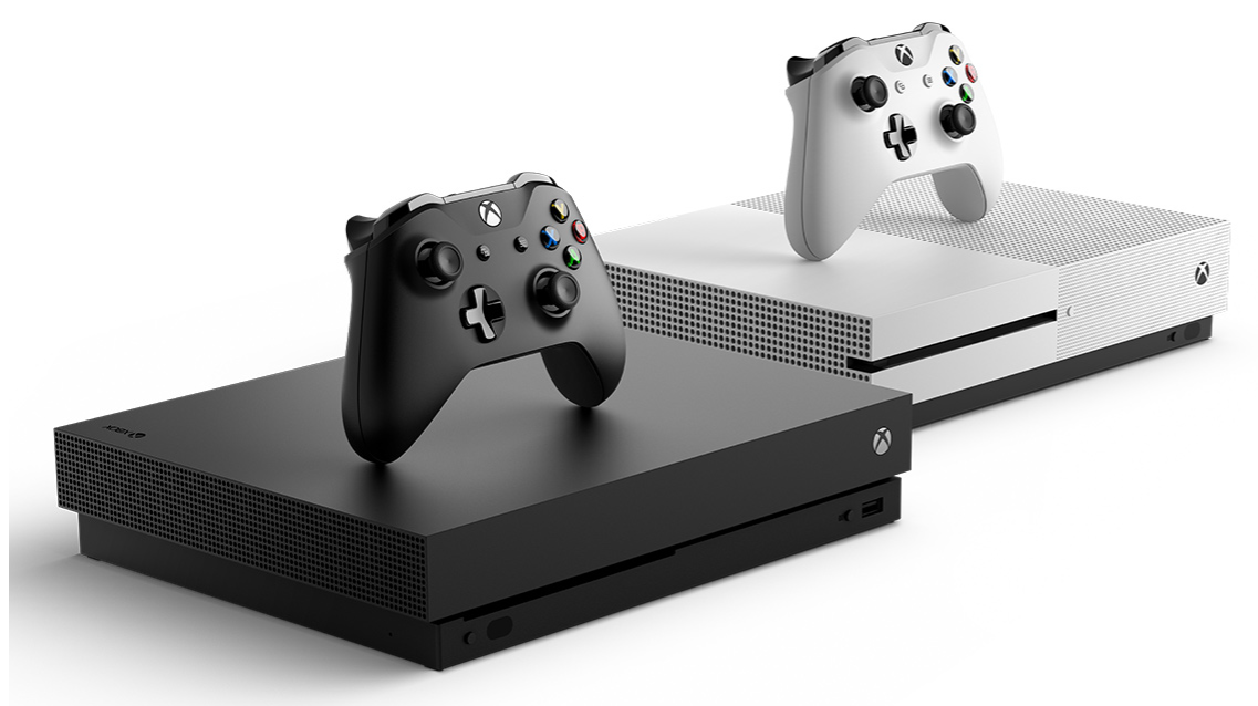 photo of two Xbox One X game consoles