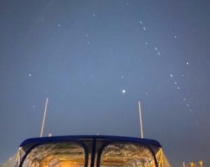 Starlink Train from a boat