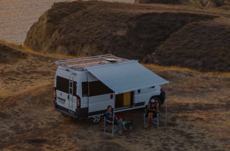 starlink flat high performance dish on a van by ocean